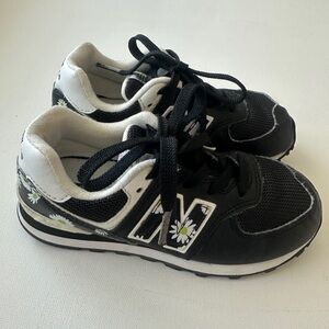 New Balance girl’s 574 Bungee sneakers daisies design. Size 12.